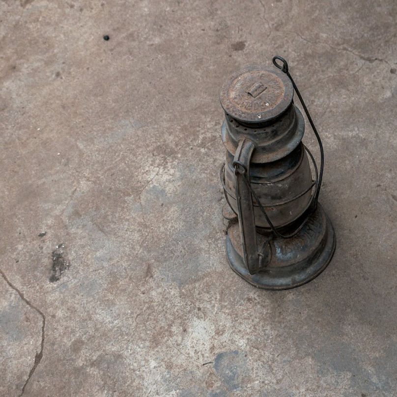A kerosene lamp previously used in the communities.