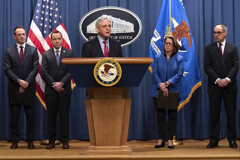 US Attorney General Merrick Garland speaks at a news conference on the Apple lawsuit at the Department of Justice headquarters in Washington.