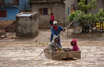 People paddle through floodwaters after cyclone Gamane hit northern Madagascar, March 28th 2024