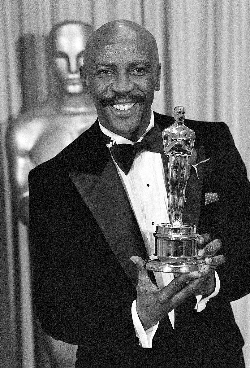 Louis Gossett Jr., poses with the Oscar for Best Supporting Actor for his role in "An Officer and a Gentleman" - 1983