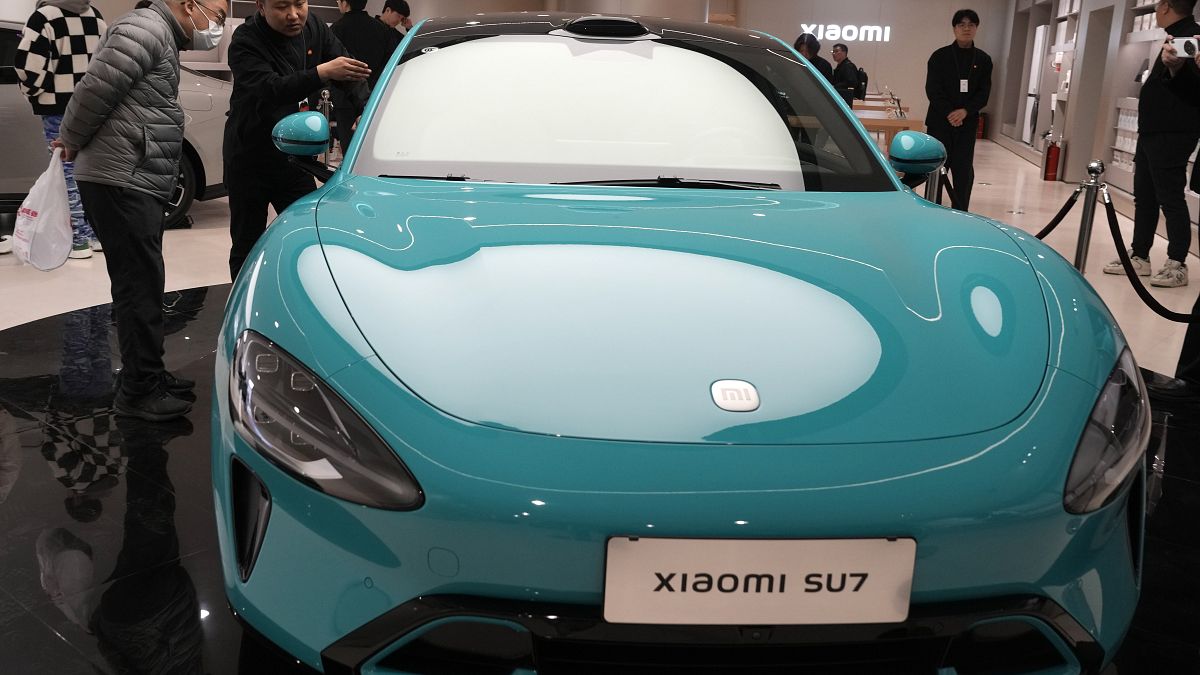 Chinese electronics maker Xiaomi launches connected electric car thumbnail