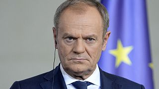 Poland's Prime Minister Donald Tusk listens to the media in Berlin, Germany, Friday, March 15, 2024.