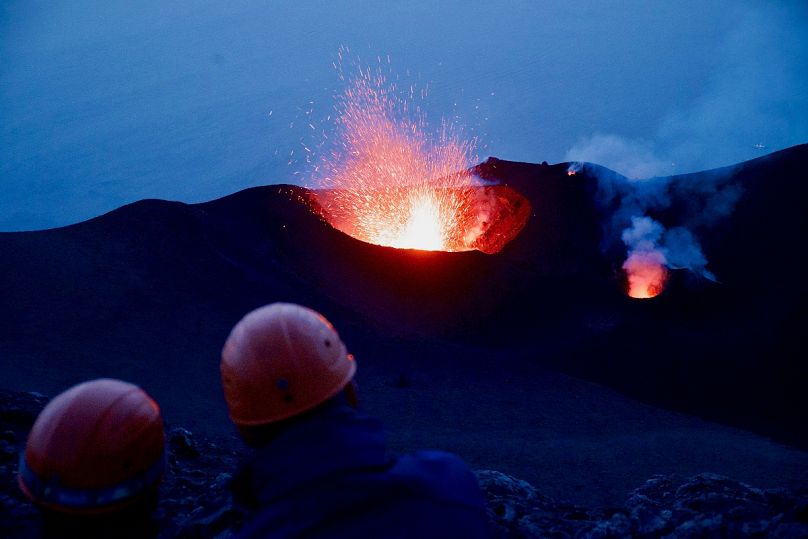 Visitors marvel at the volcanic explosions from the summit of Stromboli