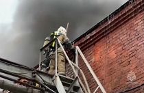 Firefighters controlling the blaze in the factory. 