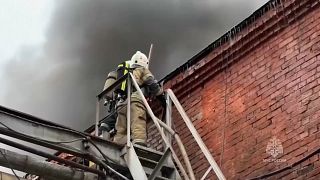 Firefighters controlling the blaze in the factory. 