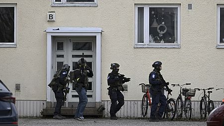Police officers at the scene of Viertola comprehensive school, in Vantaa, Finland, Tuesday, April 2, 2024.