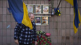 Oleksandr Turovskyi, father of Sviatoslav Turovskyi, leaves after bringing fresh flowers to the place where his son's body was abandoned, in Bucha, Ukraine, 26 March 2024