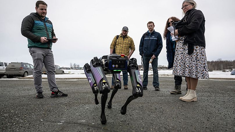 Alaska Department of Transportation program manager Ryan Marlow demonstrates the agency's robotic dog in Anchorage, Alaska, on 26 March 2024.
