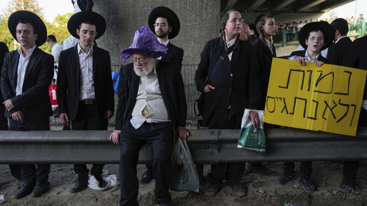 WATCH: Ultra-Orthodox Jews protest against new military draft exemption rules thumbnail