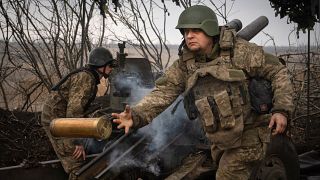 Ukrainian soldiers of the 71st Jaeger Brigade fire a M101 howitzer towards Russian positions at the frontline, near Avdiivka, Donetsk region, Ukraine, Friday, March 22, 2024.