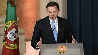 Prime Minister Luis Montenegro delivers a speech after being sworn in by Portuguese President Marcelo Rebel de Sousa at the Ajuda palace in Lisbon, Tuesday, April 2, 2024.