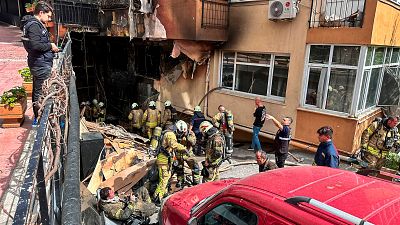 Firefighters work after a fire broke out at a nightclub in Istanbul, Turkey.