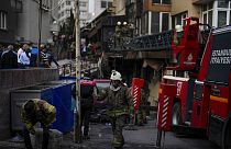 Firefighters and emergency teams work in the aftermath of a fire that broke out during day time in a nightclub in Istanbul, Turkey, Tuesday, April 2, 2024