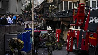 Firefighters and emergency teams work in the aftermath of a fire that broke out during day time in a nightclub in Istanbul, Turkey, Tuesday, April 2, 2024