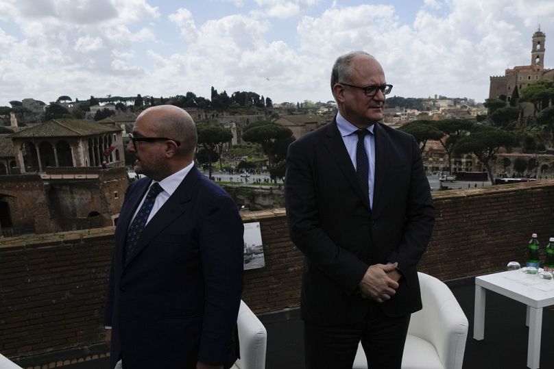 Italy's Culture Minister Gennaro Sangiuliano, left, and Rome's Mayor Roberto Gualtieri, arrive at presser to unveil a project on a new archaeological walk