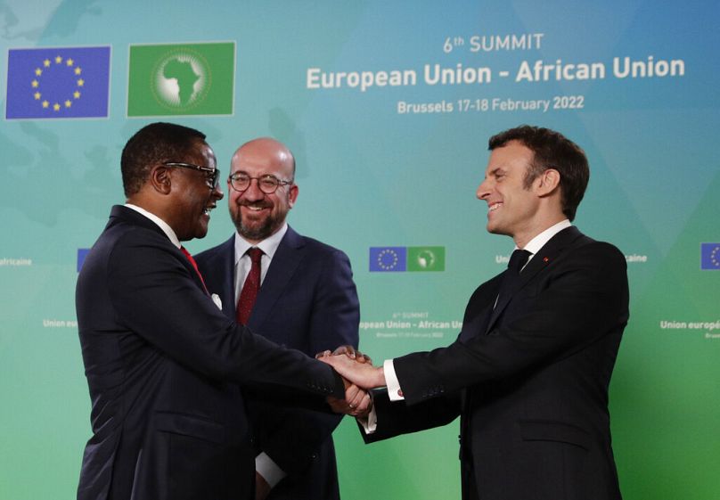 Malawi President Lazarus McCarthy Chakwera is welcomed by European Council's Charles Michel and French President Emmanuel Macron during an EU-Africa summit in Brussels, 2022