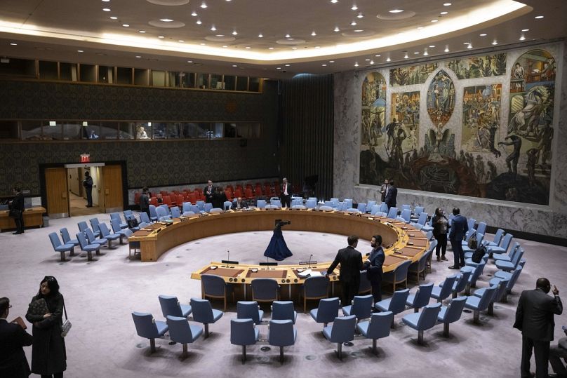 People gather during the Security Council meeting at United Nations headquarters, December 2023