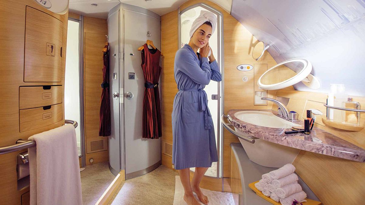 A woman after a shower in Emirates' first class 
