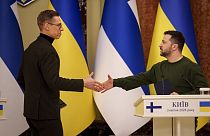Finland's President Alexander Stubb, left, shakes hands with Ukraine's President Volodymyr Zelenskyy, after a press conference in Kyiv, Ukraine, Wednesday, April 3, 2024.