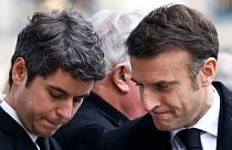 French President Emmanuel Macron, right, and Prime Minister Gabriel Attal attend a ceremony for former French justice minister Robert Badinter. Feb 14, 2024.