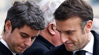 French President Emmanuel Macron, right, and Prime Minister Gabriel Attal attend a ceremony for former French justice minister Robert Badinter. Feb 14, 2024.