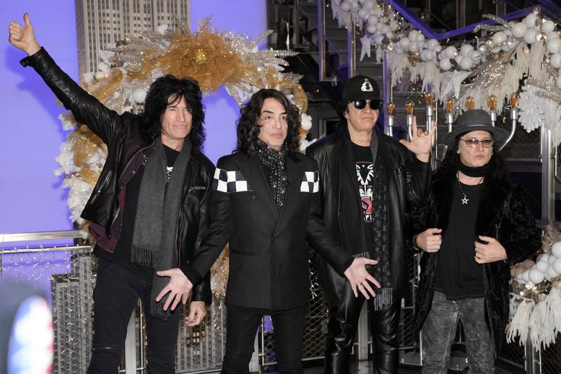 KISS band members, from left, Tommy Thayer, Paul Stanley, Gene Simmons and Eric Singer attend ceremonial lighting of the Empire State Building 30 November 2023.