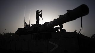 An Israeli troop on a tank. 