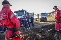 Serbian Police Rescue team search a forest near Bor, Serbia, Friday, March 29, 2024. 