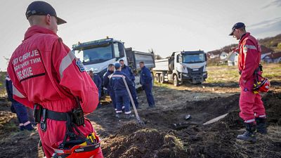 Serbian Police Rescue team search a forest near Bor, Serbia, Friday, March 29, 2024. 