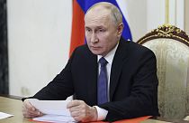 Russian President Vladimir Putin chairs a Security Council meeting via videoconference at the Kremlin in Moscow,