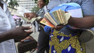 Zimbabwe unveils new currency as depreciation, inflation stoke turmoil