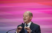 German Chancellor Olaf Scholz speaks during the Party of European Socialists (PES) Leaders Conference, at the Palace of the Parliament