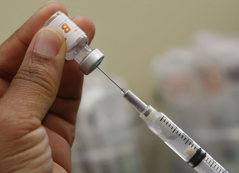 A hepatitis B vaccine is being ready to be administered at an immunisation and travel clinic in the US.