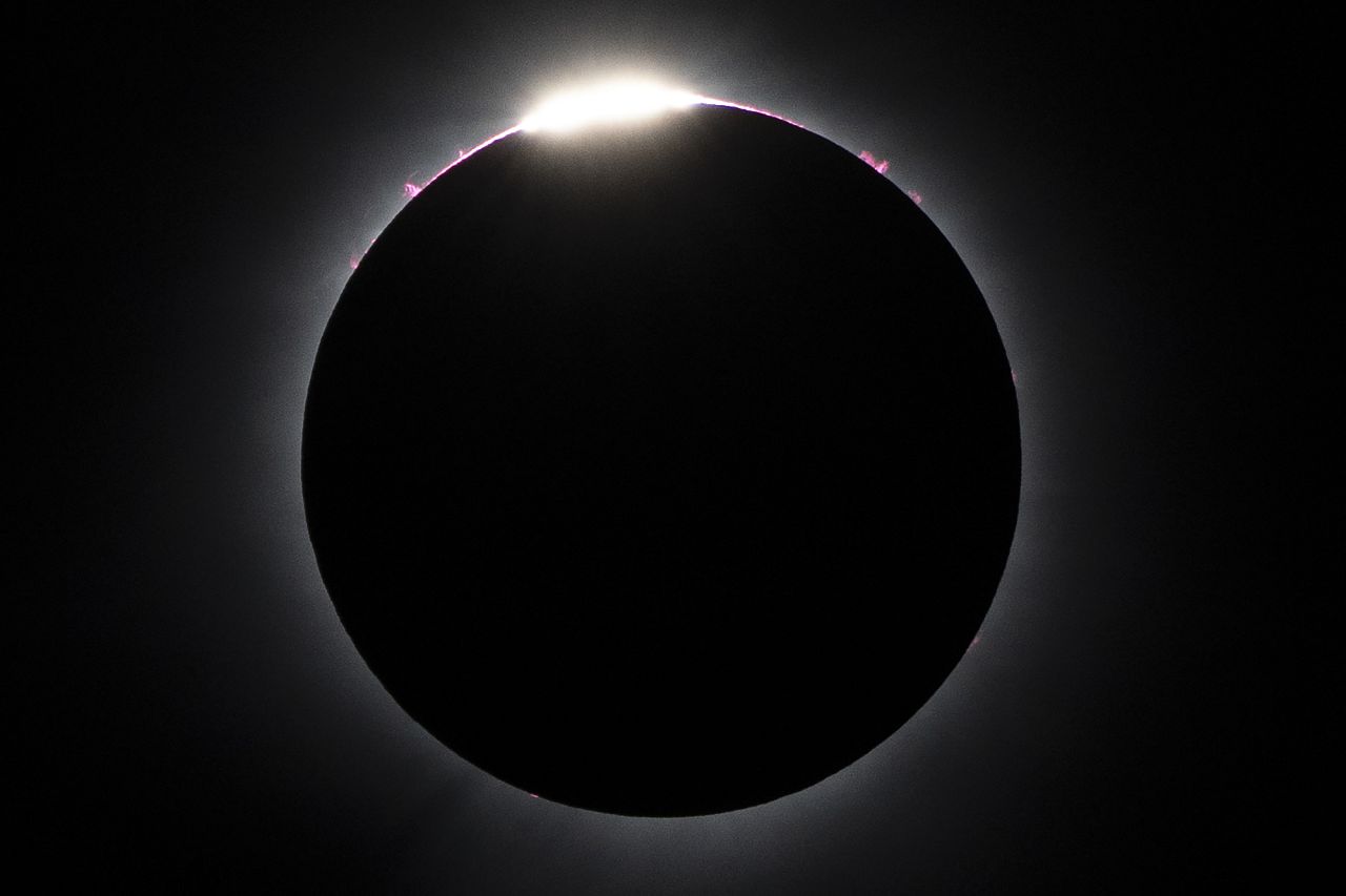 The moon nearly covers the sun during a total solar eclipse, as seen from Bishop's University in Sherbrooke, Quebec, Monday, April 8, 2024.
