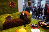 Gaetano Pesce sits among his creations at the Milan International Furniture Expo in 2010