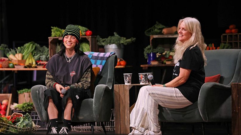 Billie Eilish and her mother Maggie Baird speak onstage during Overheated, a one-off climate activism event presented by Support + Feed and Billie Eilish - August 2023