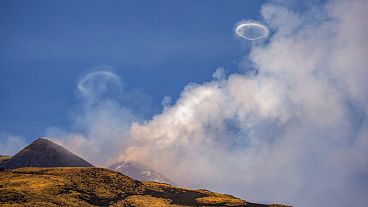 Volcanic vortex rings emerge from a new pit crater on the north side of the southeast crater of the Etna Volcano in Sicily, Italy, 5 April 2024. 