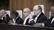Judge Nawaf Salam, center, speaks at the start of a two days hearing at the World Court in The Hague, Netherlands, Monday, April 8, 2024.