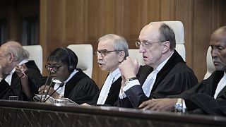 Judge Nawaf Salam, center, speaks at the start of a two days hearing at the World Court in The Hague, Netherlands, Monday, April 8, 2024.