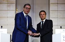 Emmanuel Macron y Alexander Vucic.