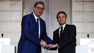 Emmanuel Macron y Alexander Vucic.