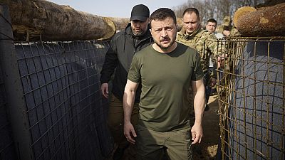 In this photo provided by the Ukrainian Presidential Press Office, Ukrainian President Volodymyr Zelenskyy inspects the fortification lines in Kharkiv, Ukraine, April 9, 2024.