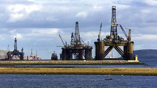 North sea oil exploration platforms lie, awaiting drilling contracts, in the Cromerty Firth in northern Scotland Sunday, March 2, 2003.