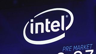 The Intel logo appears on a screen at the Nasdaq MarketSite, in New York's Times Square, on Oct. 3, 2018. 