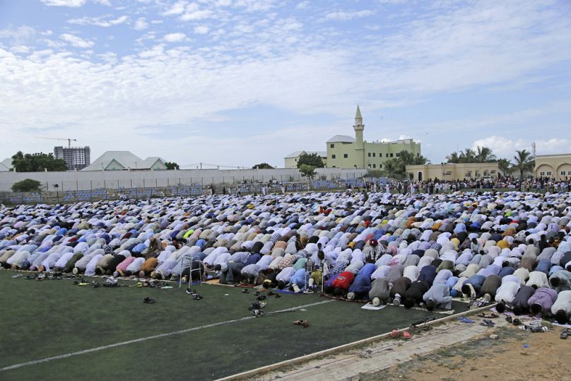Muslim devotees offer Eid al-Fitr prayers to mark the end of Ramadan, the Islamic holy month of fasting, in Mogadishu, Somalia Wednesday, April. 10, 2024.