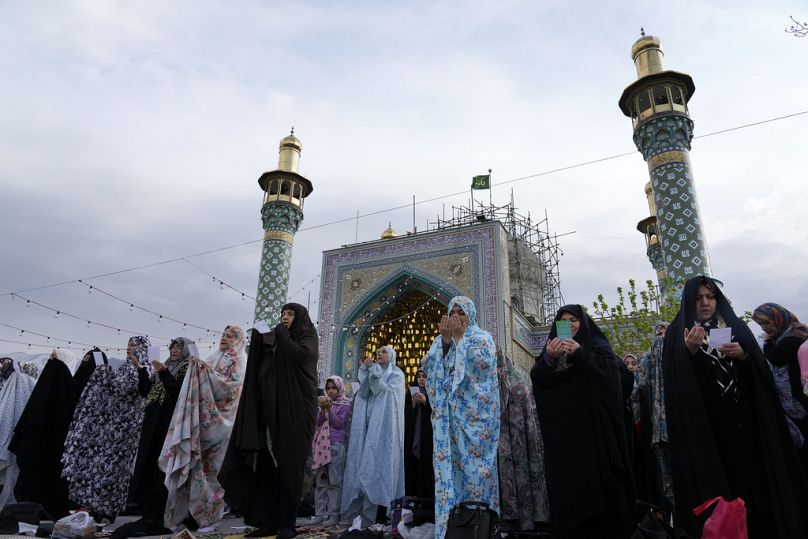 Iranian worshippers perform Eid al-Fitr prayer in Tehran, Iran, Wednesday, April 10, 2024.