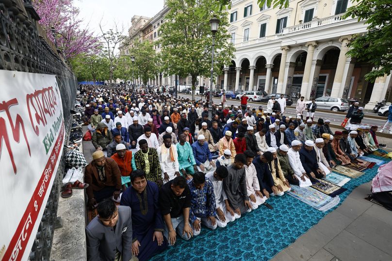 Muslims pray on the first day of the Muslim holiday of Eid al-Fitr in Rome, Italy, Wednesday, April 10, 2024.