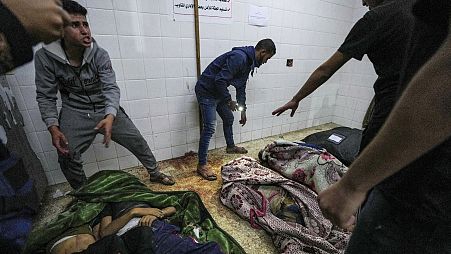 Bodies of people killed in the Israeli bombardment of the Gaza Strip are brought to al Aqsa Hospital in Deir al Balah, Gaza Strip, April 9, 2024.