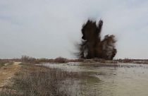 Emergency responders in Kazakhstan blow up artificial dams to counter floods.