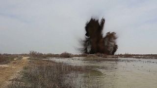 Emergency responders in Kazakhstan blow up artificial dams to counter floods.